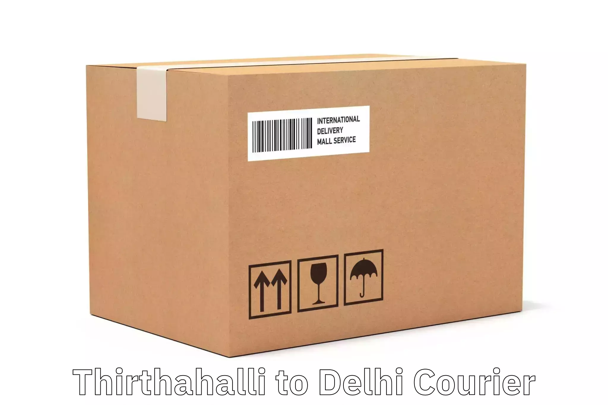 24-hour courier service Thirthahalli to Jamia Millia Islamia New Delhi