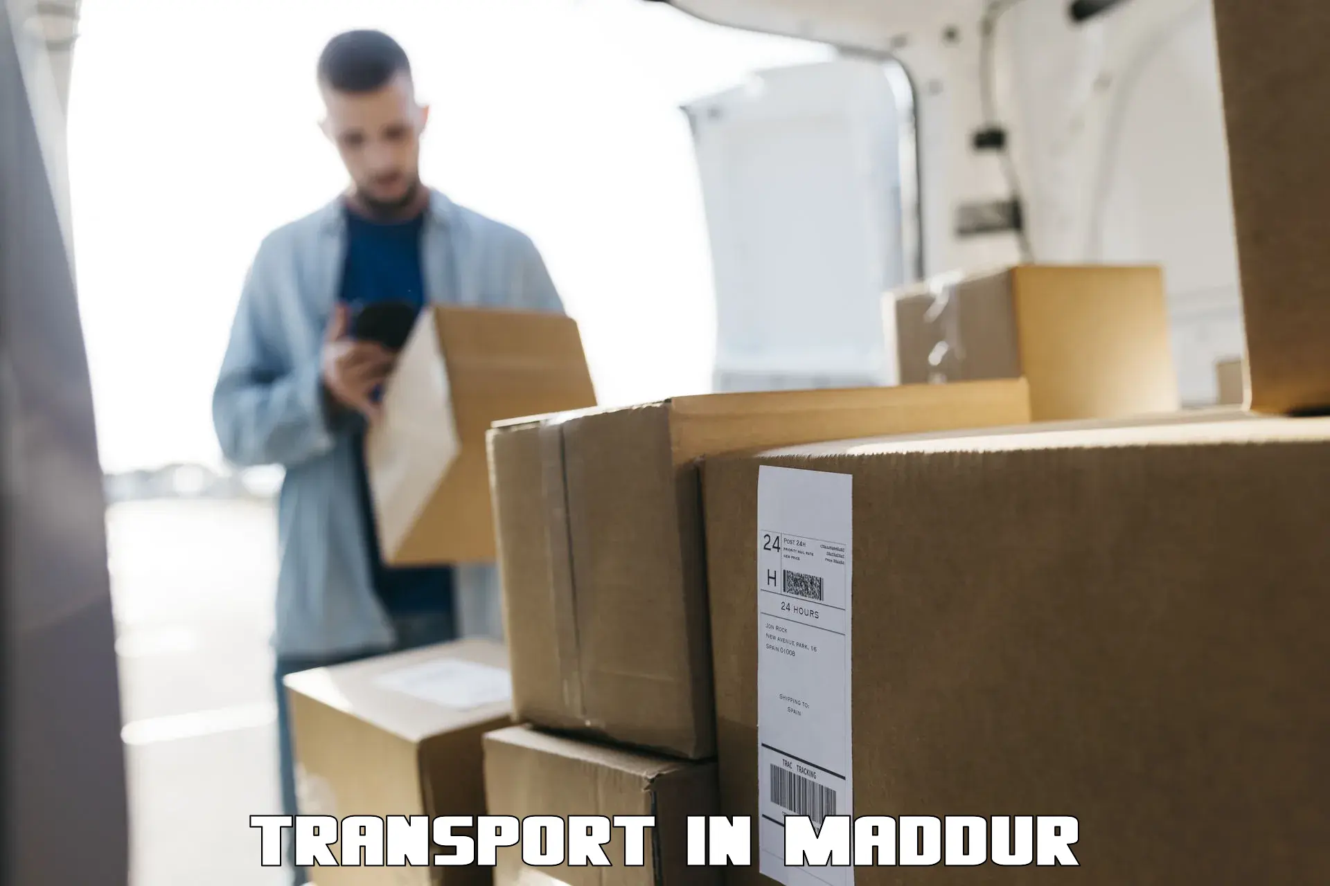 Interstate goods transport in Maddur